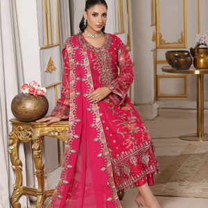 Model wearing FLEUR 01 pink Pakistani embroidered chiffon suit by Noors