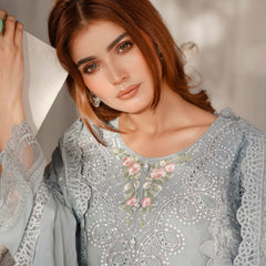 Model wearing AERGUL 02 sky blue Pakistani embroidered chiffon suit by Noors