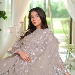 Model wearing BRISA 07 l/purple Pakistani embroidered chiffon suit by Noors