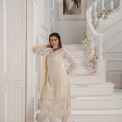 Model wearing GLAMOURA 06 ash white Pakistani embroidered chiffon suit by Noors