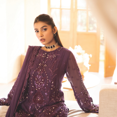 Model wearing ESHAAL 01 violet Pakistani embroidered chiffon suit by Noors