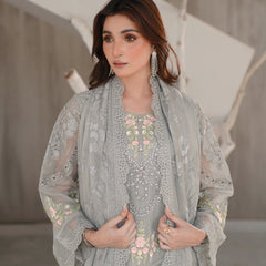 Model wearing AERGUL 05 grey Pakistani embroidered chiffon suit by Noors