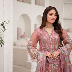Model wearing SAHOOR 02 tea pink Pakistani embroidered chiffon suit by Noors