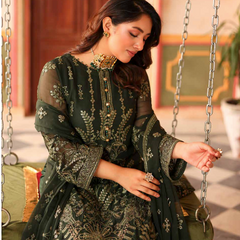Model wearing NURIN 05 poison green Pakistani embroidered chiffon suit by Noors