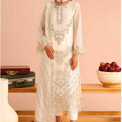 Model wearing ARMELIA 02 off-white Pakistani embroidered chiffon suit by Noors